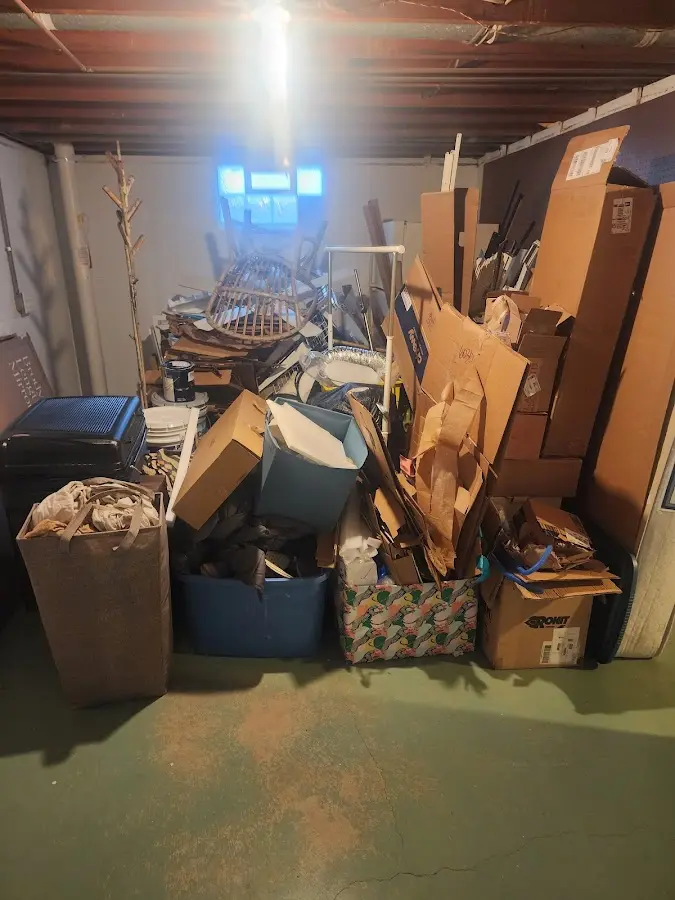 Roll-off dumpster container at job site for 2 Yard Dumpster Rental in Edgewood